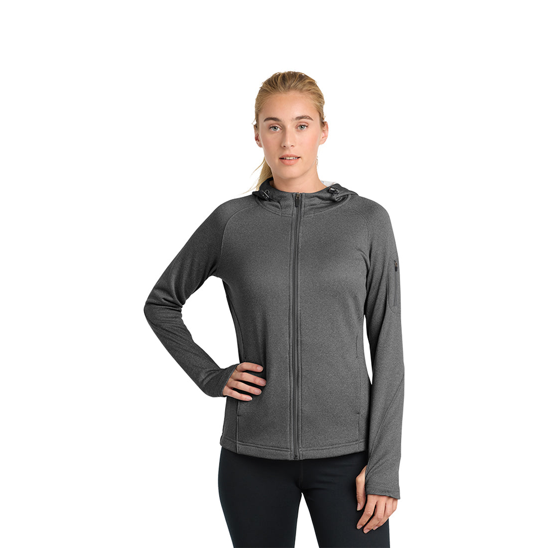 Woman wearing a dark gray jacket on a white background