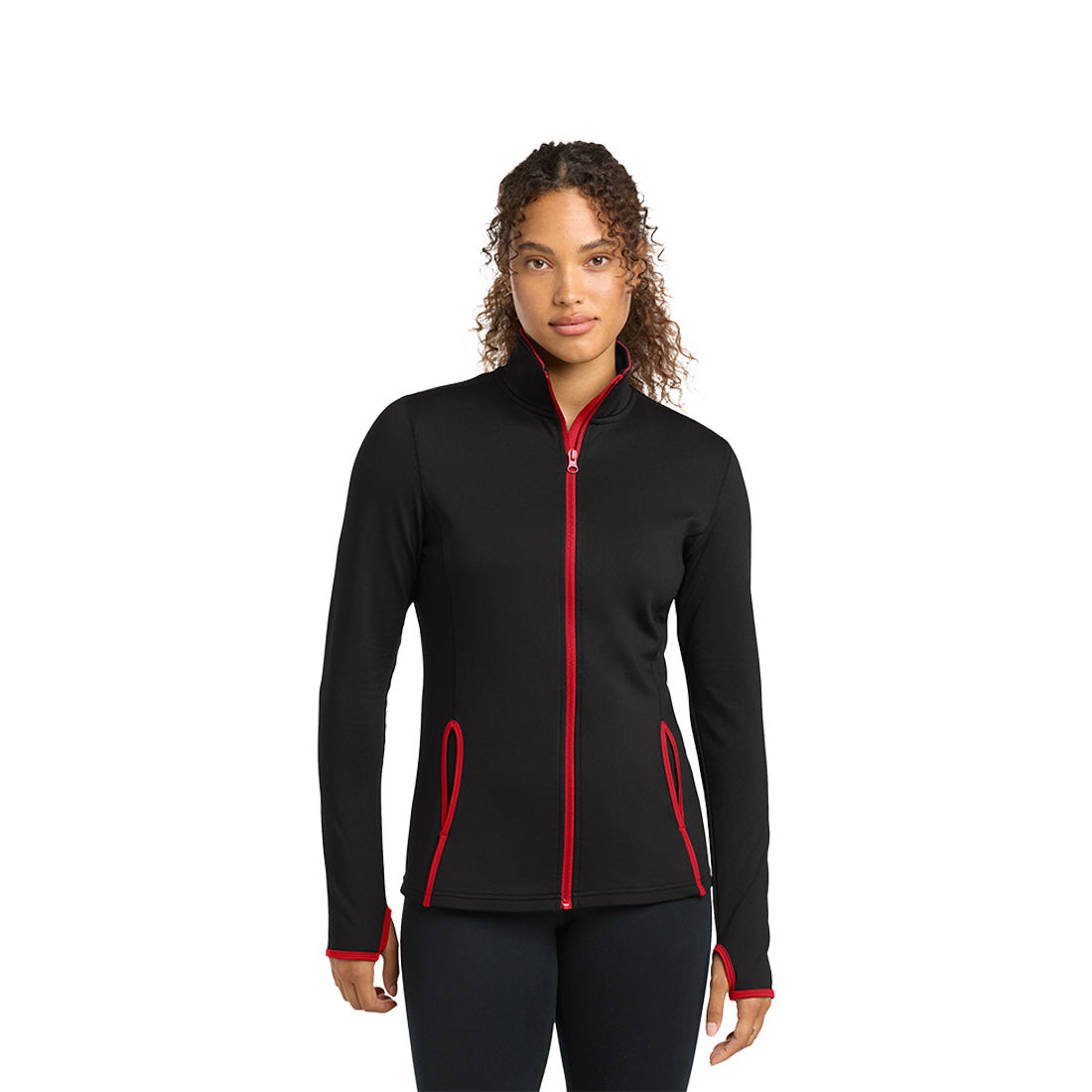 Woman wearing a black jacket with red accents on a white background