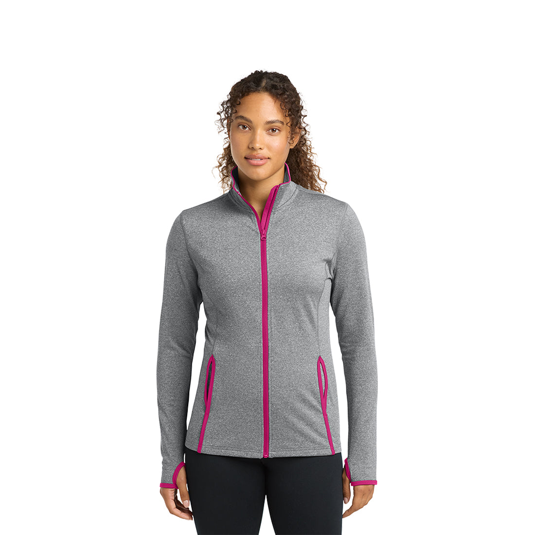 Woman wearing a gray jacket with pink accents on a white background