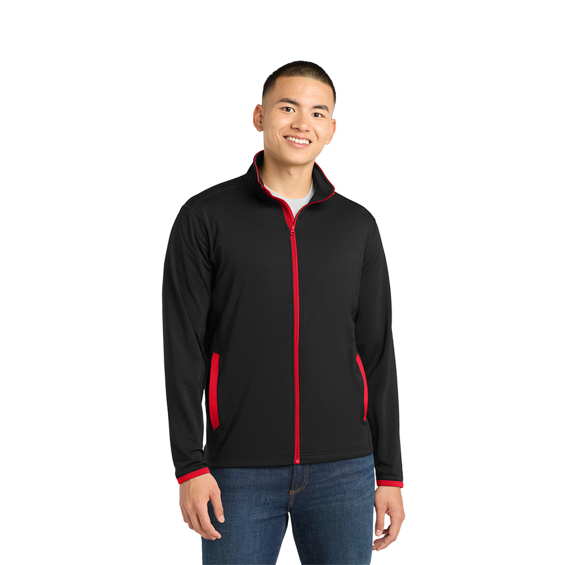 Man wearing a black jacket with red accents on a white background