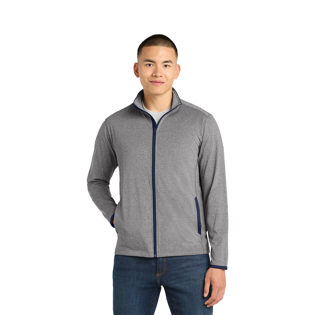 Man wearing a gray zip-up jacket with navy accents on a white background