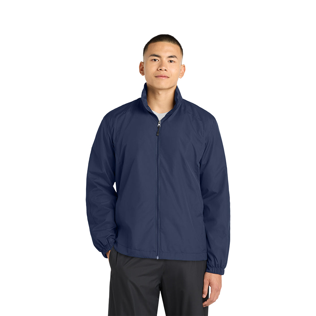 Man wearing a navy jacket on a white background