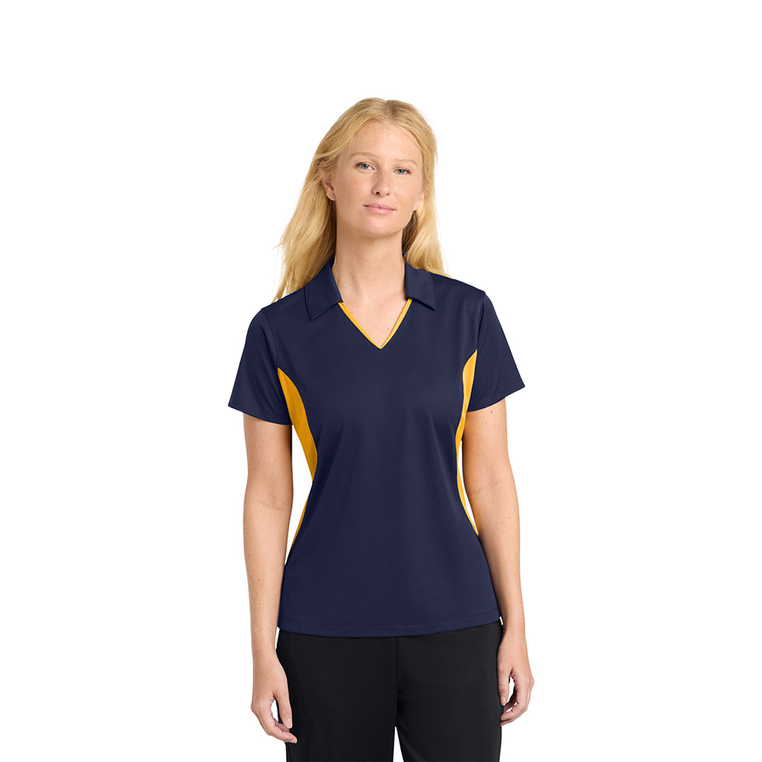 Woman wearing a navy and gold polo shirt on a white background