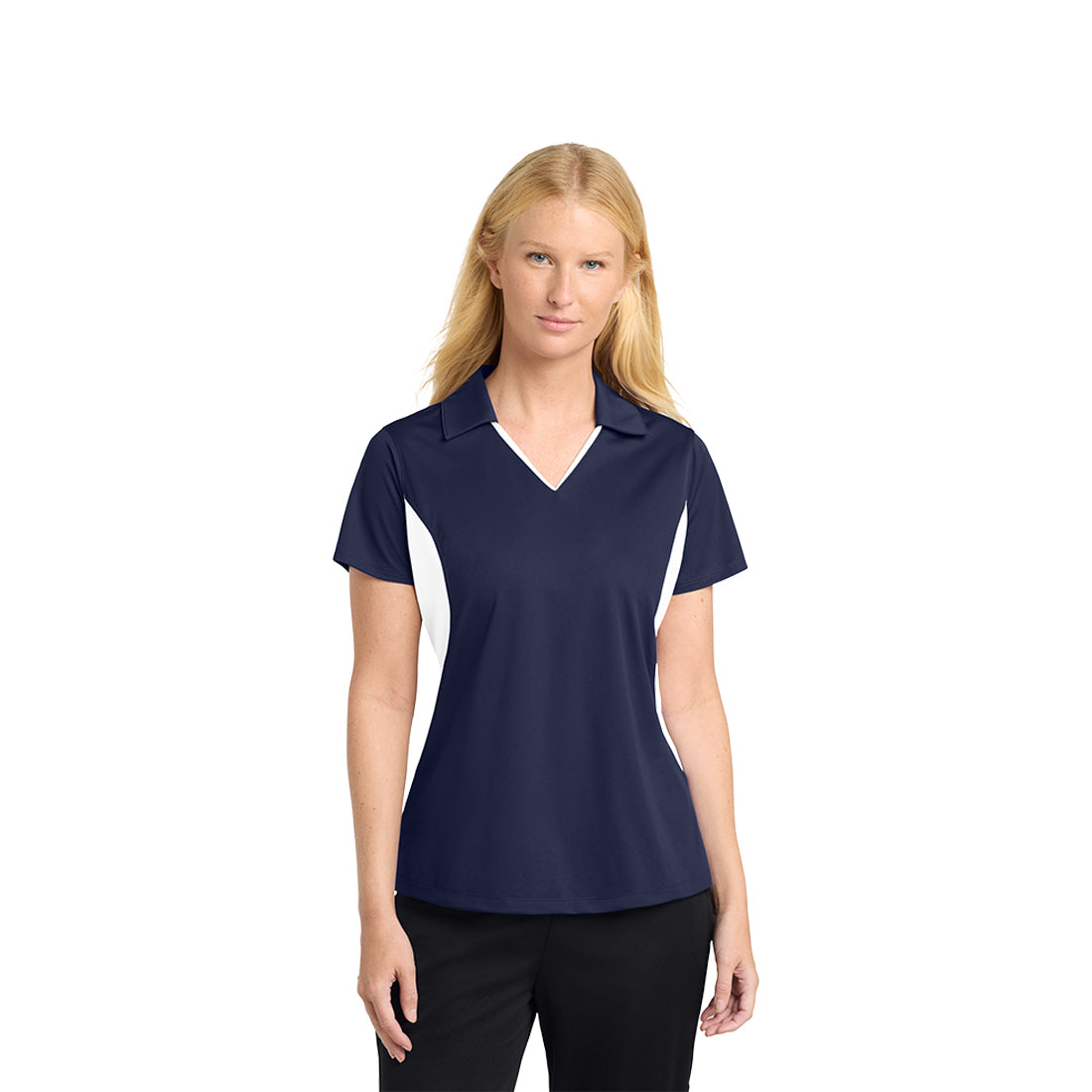 Woman wearing a navy and white polo shirt on a white background