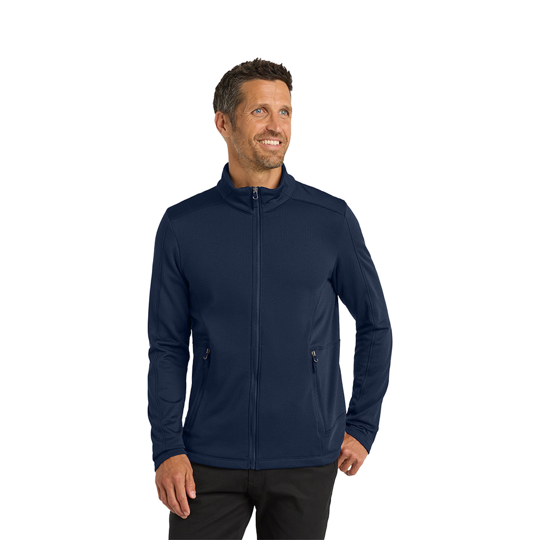 Man in a dark blue zip up on a white background