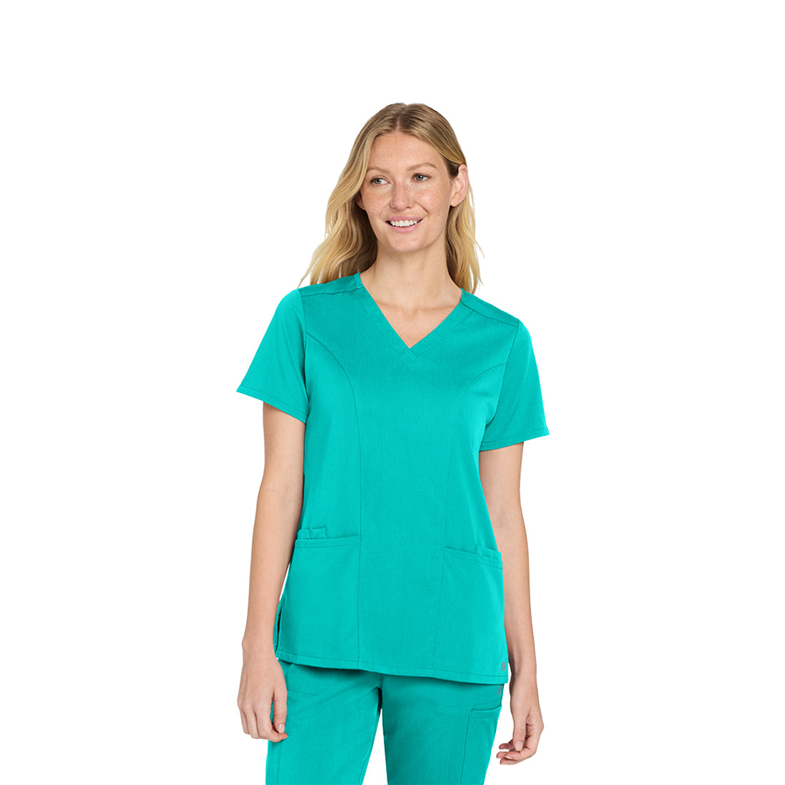 Woman wearing a teal scrub set on a white background