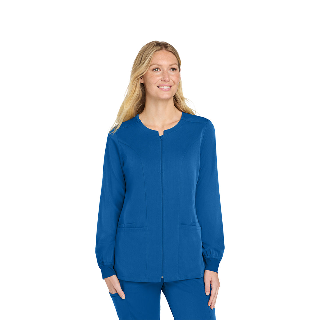 Woman wearing a blue scrub top on a white background