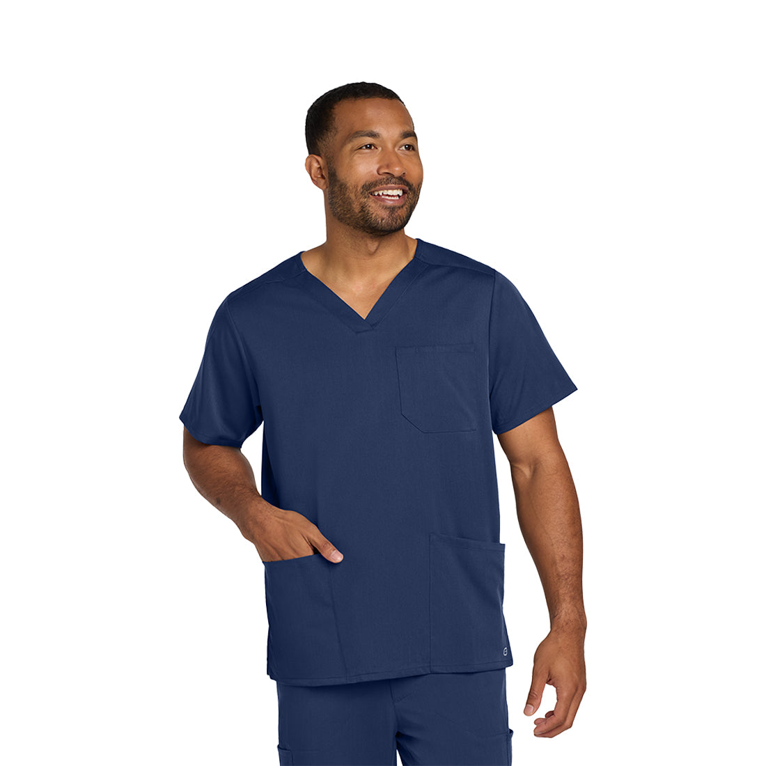 Man wearing a navy blue scrub top on a white background