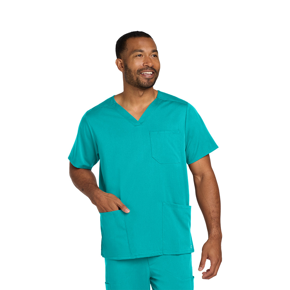 Man wearing a teal scrub set on a white background