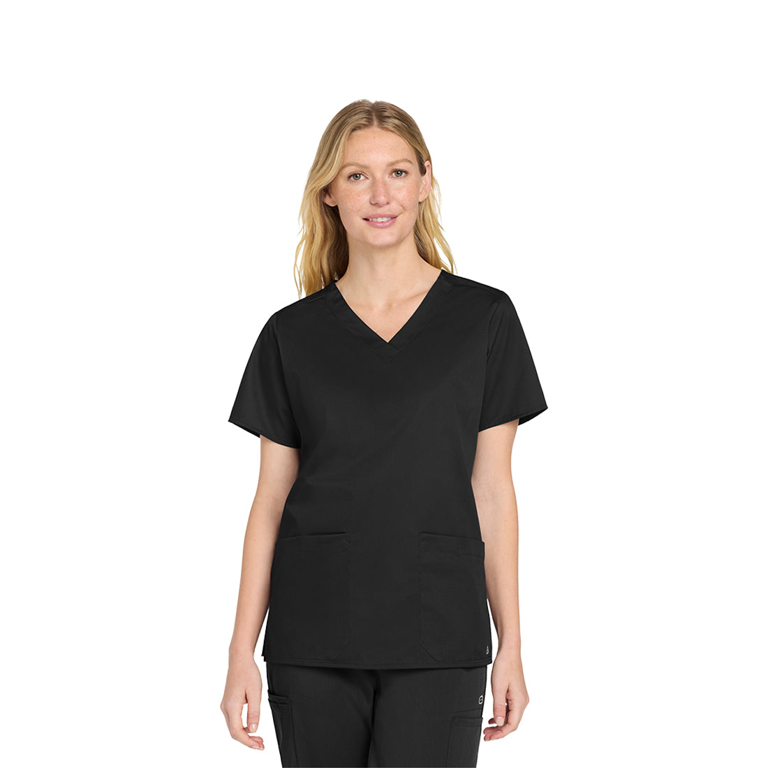 Woman wearing a black scrub set on a white background