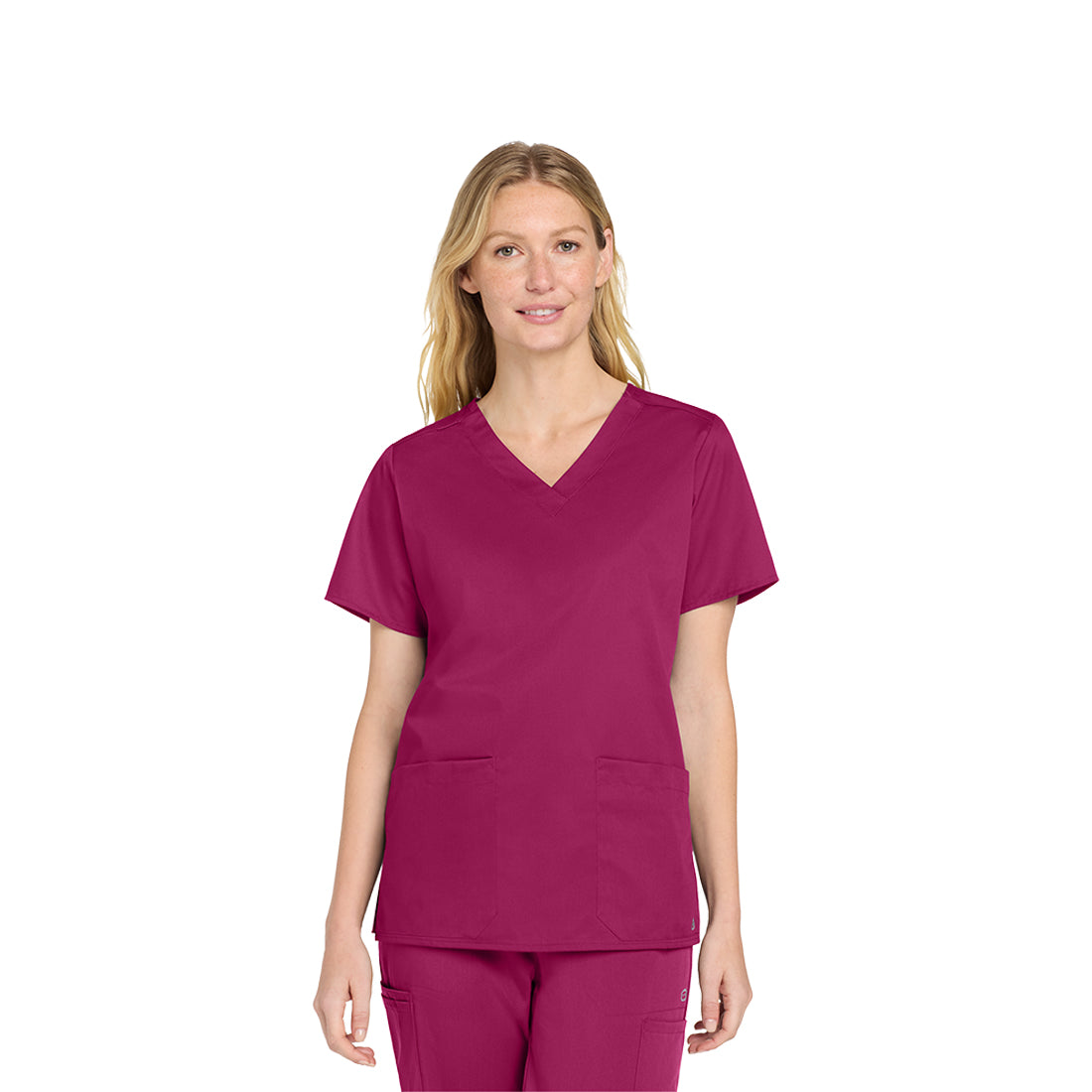Woman wearing a wine scrub set on a white background