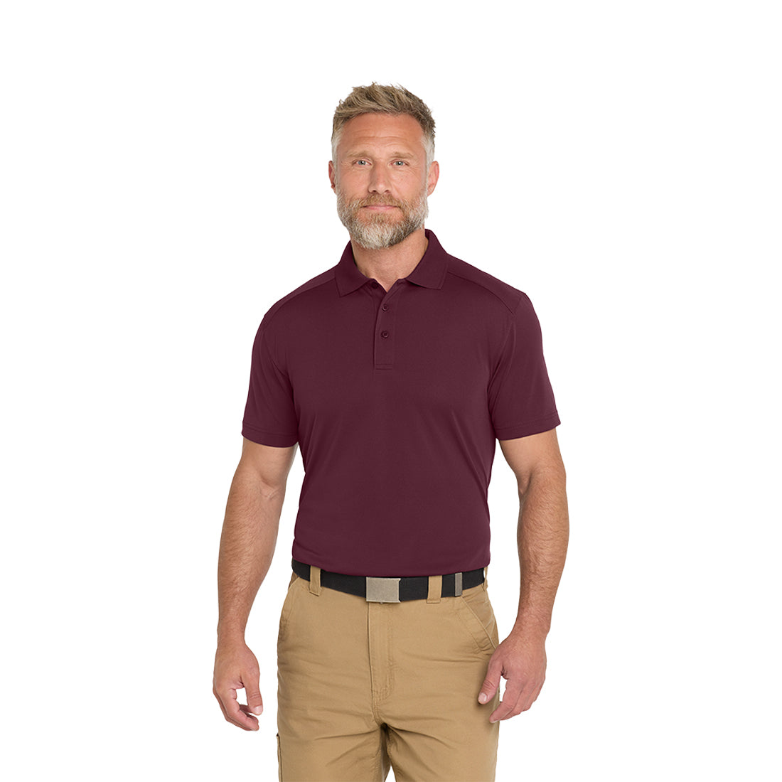 Man wearing a maroon polo shirt and beige pants on a white background