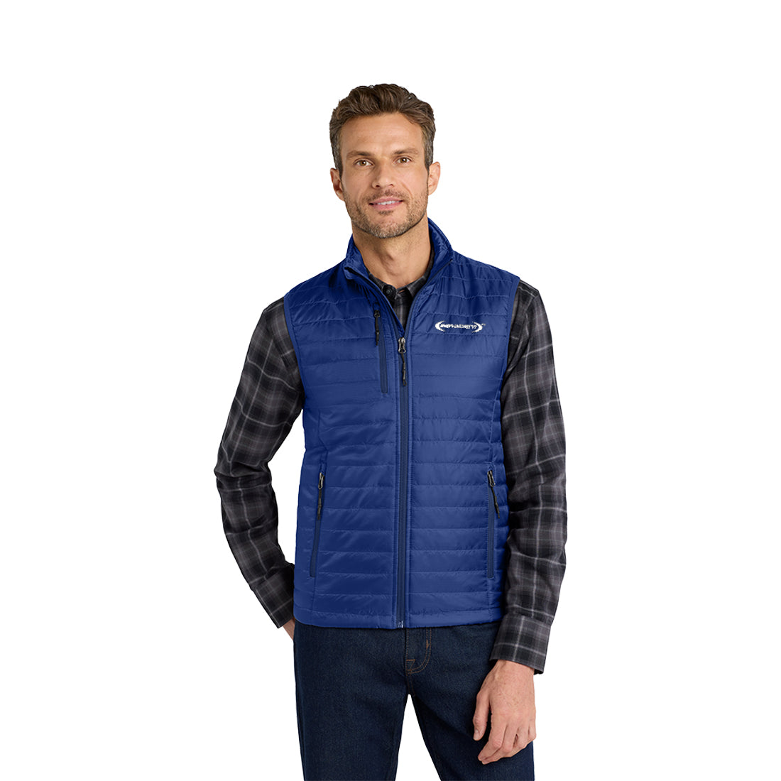 Man wearing a blue puffer vest over a dark shirt on a white background